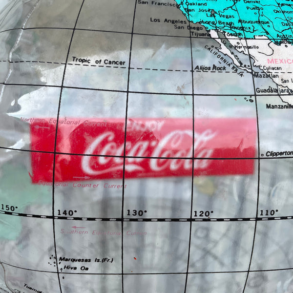 Reklame Coca Cola Wasserball als Weltkugel