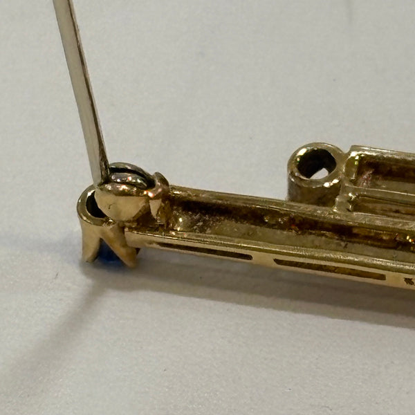 Feuer und Eis Brosche - 750er Goldbrosche mit Saphir und Rubin