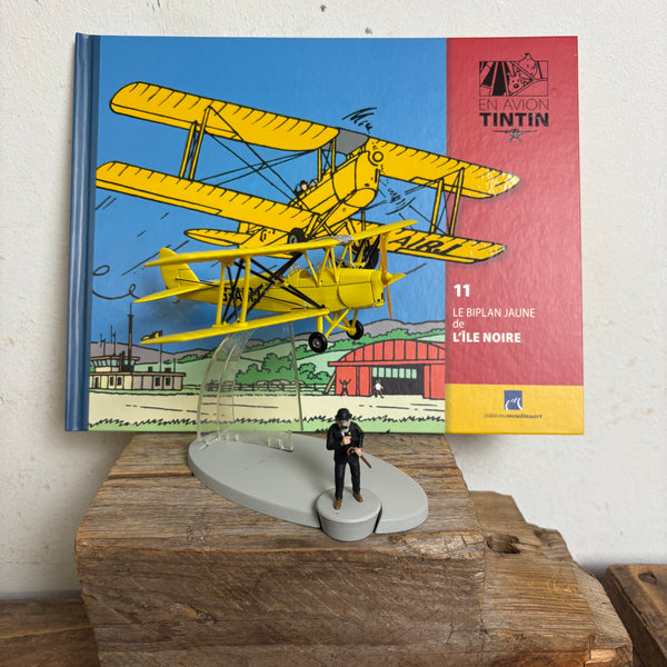 Modell Figur und Buch Tim und Struppi der Gelbe Doppeldecker mit Schulze aus Die schwarze Insel