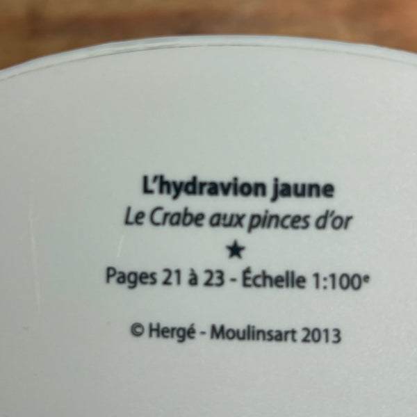 Modell Figur und Buch Tim und Struppi das Gelbe Wasserflugzeug mit Tim aus Der Goldene Krebs