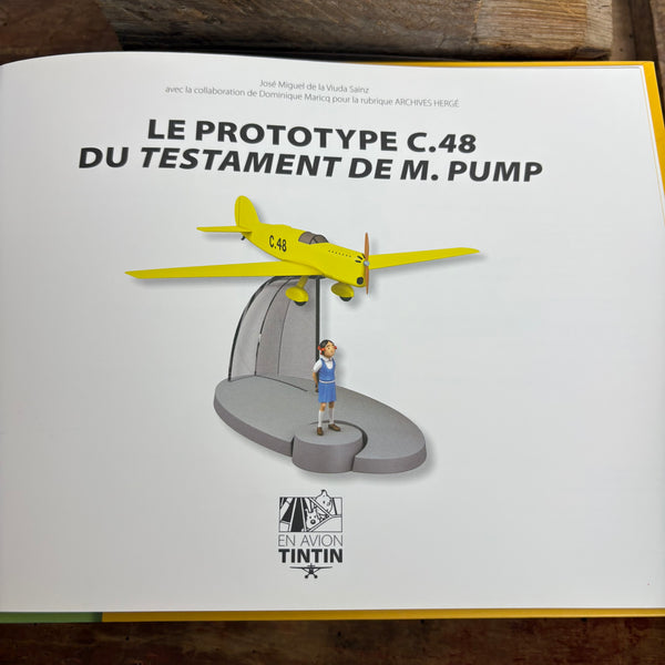 Modell Figur und Buch Tim und Struppi Das Gelbe Flugzeug Prototyp C.48 mit Zette aus Das Testament des M. Pump
