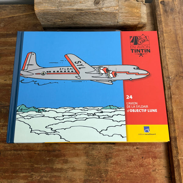 Modell Figur und Buch Tim und Struppi das Syldavisches Flugzeug mit Kapitän Haddock
aus Ziel Mond