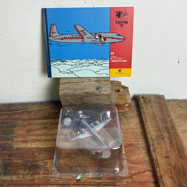 Modell Figur und Buch Tim und Struppi das Syldavisches Flugzeug mit Kapitän Haddock
aus Ziel Mond