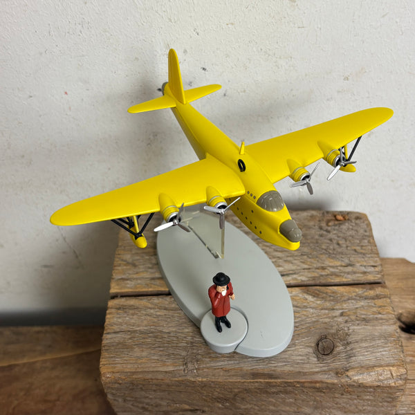 Modell Figur und Buch Tim und Struppi das Gelbe Wasserflugzeug mit Nestor aus Die sieben Kristallkugeln