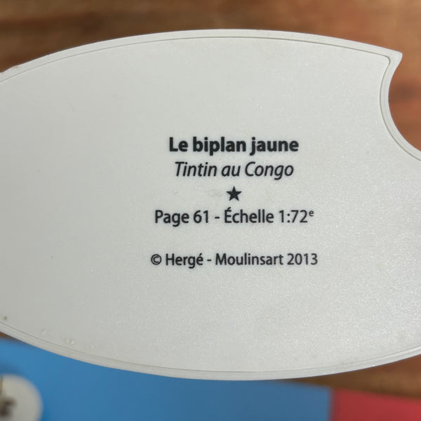 Modell Figur und Buch Tim und Struppi der Gelbe Doppeldecker mit Tim aus Tim im Kongo