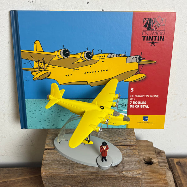Modell Figur und Buch Tim und Struppi das Gelbe Wasserflugzeug mit Nestor aus Die sieben Kristallkugeln