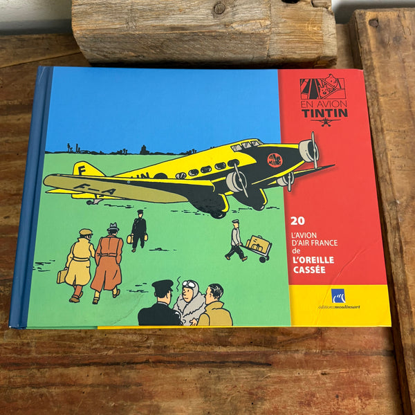 Modell Figur und Buch Tim und Struppi das Gelbe Passagierflugzeug mit Basil aus Der Arumbaya-Fetisch