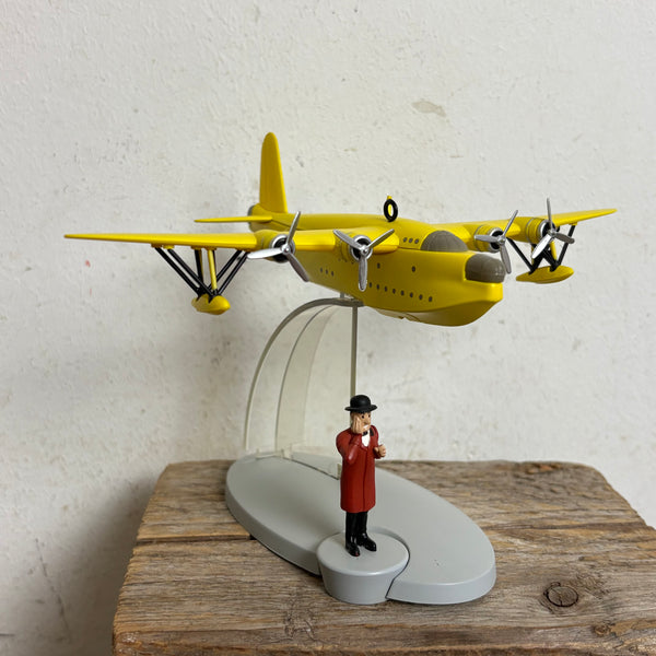 Modell Figur und Buch Tim und Struppi das Gelbe Wasserflugzeug mit Nestor aus Die sieben Kristallkugeln