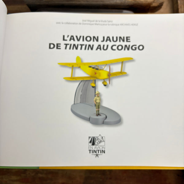 Modell Figur und Buch Tim und Struppi der Gelbe Doppeldecker mit Tim aus Tim im Kongo