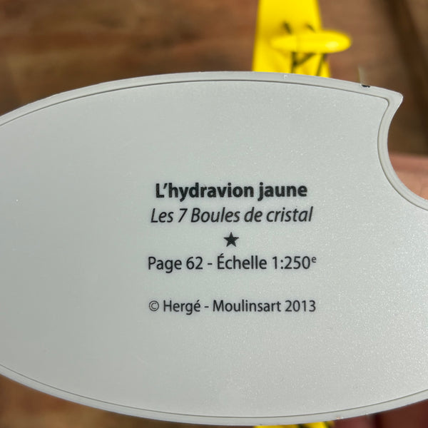 Modell Figur und Buch Tim und Struppi das Gelbe Wasserflugzeug mit Nestor aus Die sieben Kristallkugeln
