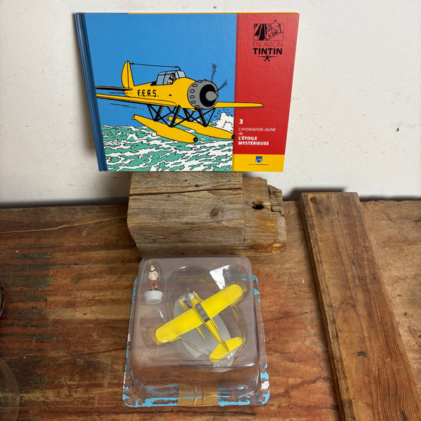 Modell Figur und Buch Tim und Struppi Das Gelbe Wasserflugzeug mit Tim aus Der geheimnisvolle Stern