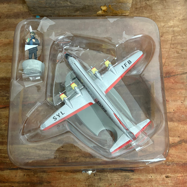 Modell Figur und Buch Tim und Struppi das Syldavisches Flugzeug mit Kapitän Haddock
aus Ziel Mond