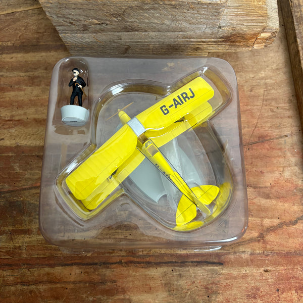 Modell Figur und Buch Tim und Struppi der Gelbe Doppeldecker mit Schulze aus Die schwarze Insel