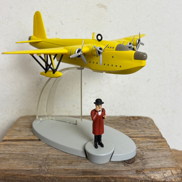 Modell Figur und Buch Tim und Struppi das Gelbe Wasserflugzeug mit Nestor aus Die sieben Kristallkugeln