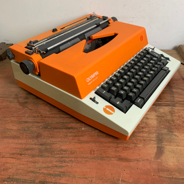 Vintage elektrische Schreibmaschine Olympia International in orange