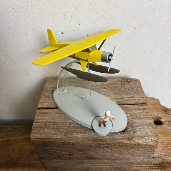 Modell Figur und Buch Tim und Struppi das Gelbe Wasserflugzeug mit Tim aus Der Goldene Krebs