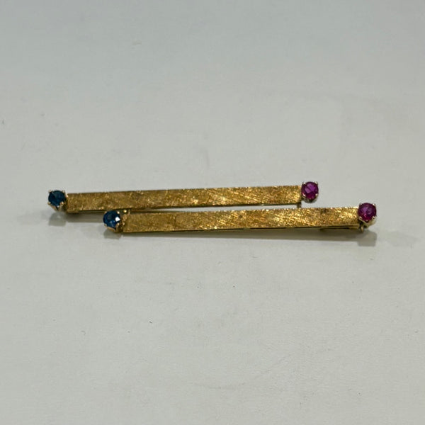Feuer und Eis Brosche - 750er Goldbrosche mit Saphir und Rubin