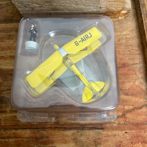 Modell Figur und Buch Tim und Struppi der Gelbe Doppeldecker mit Schulze aus Die schwarze Insel