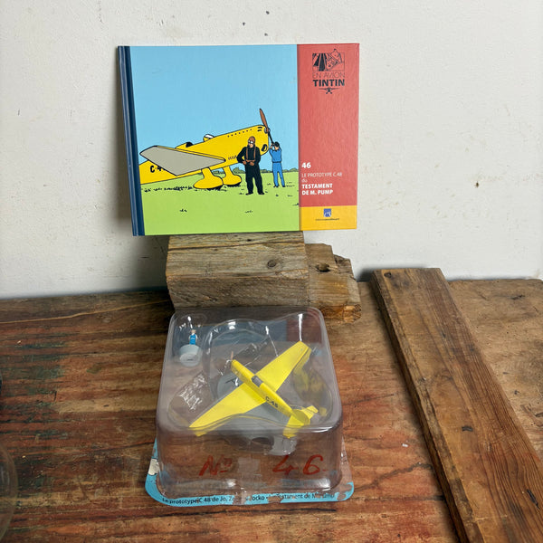 Modell Figur und Buch Tim und Struppi Das Gelbe Flugzeug Prototyp C.48 mit Zette aus Das Testament des M. Pump