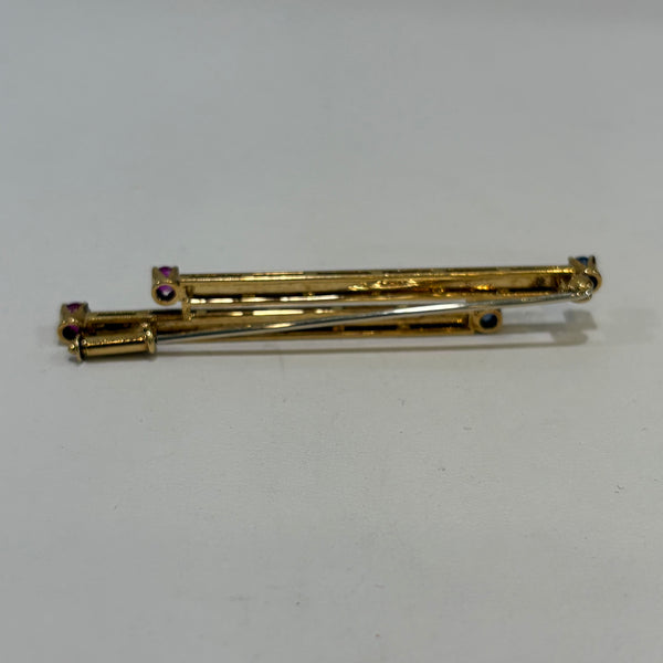 Feuer und Eis Brosche - 750er Goldbrosche mit Saphir und Rubin