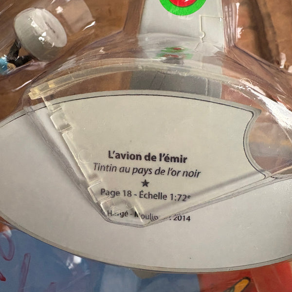 Modell Figur und Buch Tim und Struppi Das Gelbe Jagdflugzeug des Emirs mit Tim aus Im Reich des Schwarzen Goldes