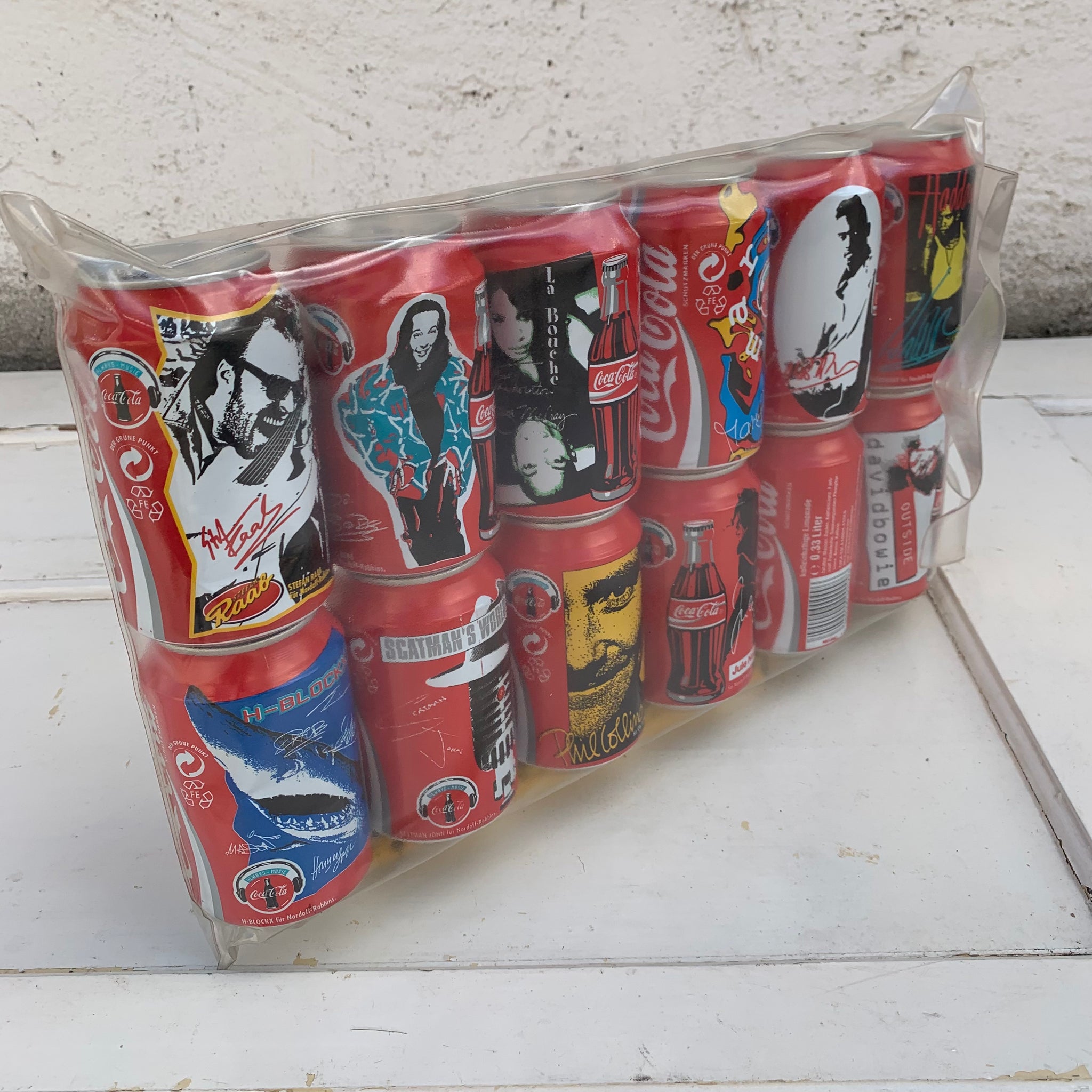 Coca Cola Dosen eingeschweißte Schaupackung